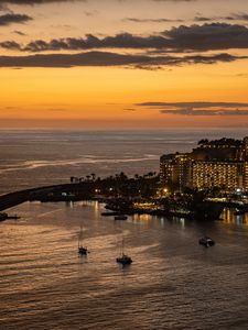 Preview wallpaper sea, island, boats, shore, lights, evening