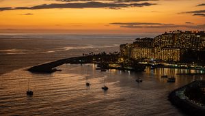 Preview wallpaper sea, island, boats, shore, lights, evening
