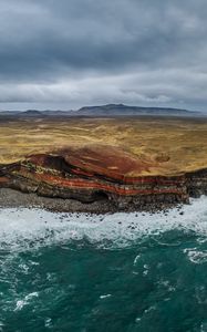 Preview wallpaper sea, island, rocks, cave, landscape