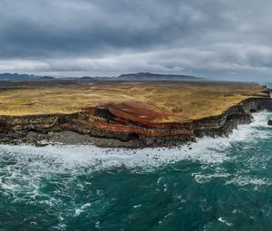 Preview wallpaper sea, island, rocks, cave, landscape