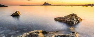 Preview wallpaper sea, island, silhouette, stones, nature