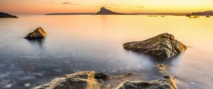 Preview wallpaper sea, island, silhouette, stones, nature