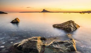 Preview wallpaper sea, island, silhouette, stones, nature