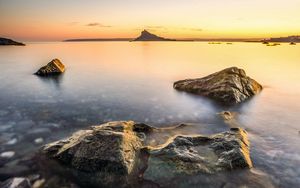 Preview wallpaper sea, island, silhouette, stones, nature