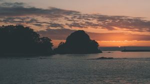 Preview wallpaper sea, island, trees, silhouettes, twilight