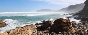 Preview wallpaper sea, landscape, stones, pebbles, mountains