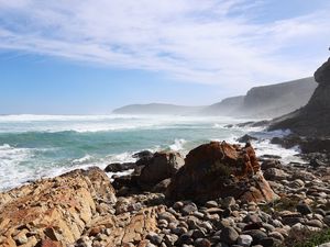 Preview wallpaper sea, landscape, stones, pebbles, mountains