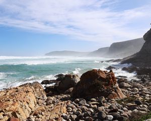 Preview wallpaper sea, landscape, stones, pebbles, mountains