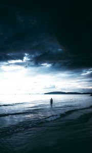 Preview wallpaper sea, man, lonely, overcast, clouds