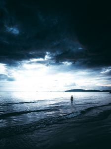 Preview wallpaper sea, man, lonely, overcast, clouds