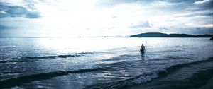 Preview wallpaper sea, man, lonely, overcast, clouds