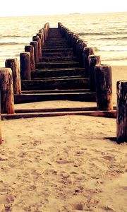 Preview wallpaper sea, mooring, columns, sand, beach