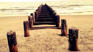 Preview wallpaper sea, mooring, columns, sand, beach