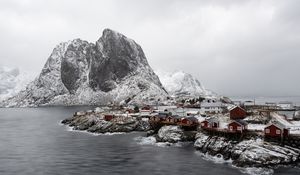 Preview wallpaper sea, mountain, snow, houses, nature