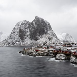 Preview wallpaper sea, mountain, snow, houses, nature