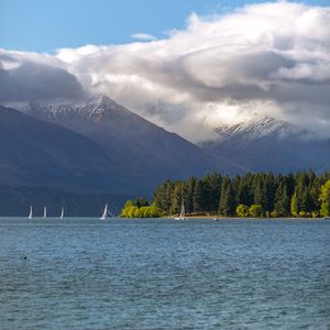 Preview wallpaper sea, mountains, boats, clouds, landscape, nature