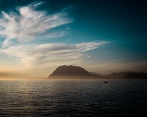 Preview wallpaper sea, mountains, horizon, evening