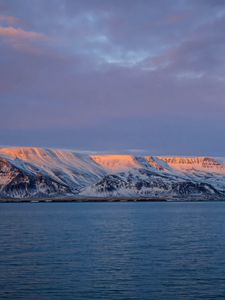 Preview wallpaper sea, mountains, slopes, snow, sky, nature