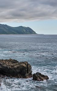 Preview wallpaper sea, mountains, stones, rocks, nature, clouds