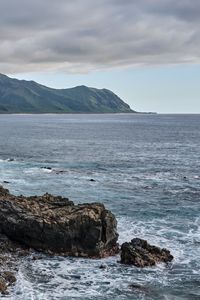 Preview wallpaper sea, mountains, stones, rocks, nature, clouds