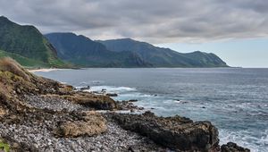 Preview wallpaper sea, mountains, stones, rocks, nature, clouds
