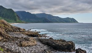 Preview wallpaper sea, mountains, stones, rocks, nature, clouds