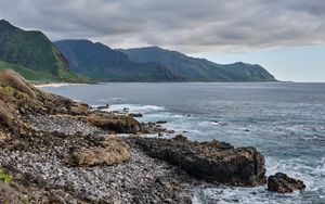 Preview wallpaper sea, mountains, stones, rocks, nature, clouds