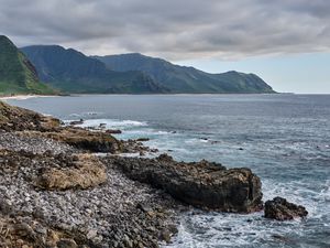 Preview wallpaper sea, mountains, stones, rocks, nature, clouds