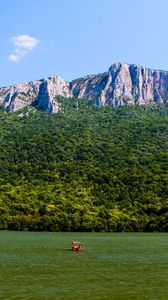 Preview wallpaper sea, mountains, trees, hill, landscape