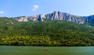 Preview wallpaper sea, mountains, trees, hill, landscape