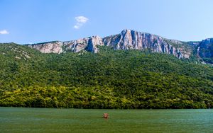 Preview wallpaper sea, mountains, trees, hill, landscape