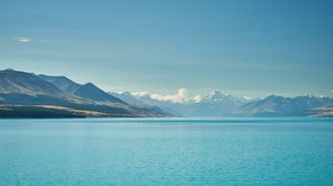 Preview wallpaper sea, mountains, water, sky, horizon, clouds