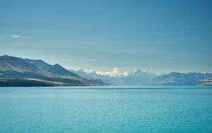 Preview wallpaper sea, mountains, water, sky, horizon, clouds