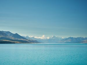 Preview wallpaper sea, mountains, water, sky, horizon, clouds