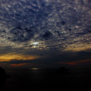 Preview wallpaper sea, night, clouds, sky, sunset, horizon