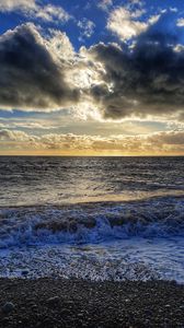 Preview wallpaper sea, pebbles, coast, horizon, sky