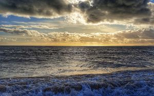 Preview wallpaper sea, pebbles, coast, horizon, sky