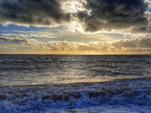 Preview wallpaper sea, pebbles, coast, horizon, sky