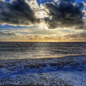 Preview wallpaper sea, pebbles, coast, horizon, sky