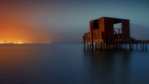 Preview wallpaper sea, pier, construction, wooden, surface, smooth surface, distance, fires