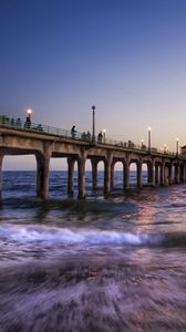 Preview wallpaper sea, pier, lanterns, people, waves