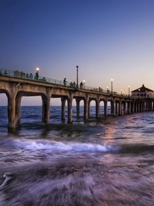 Preview wallpaper sea, pier, lanterns, people, waves