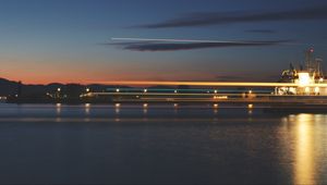 Preview wallpaper sea, pier, lights, long exposure, evening, twilight, reflection