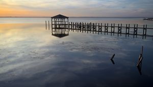 Preview wallpaper sea, pier, pilings, horizon