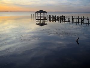 Preview wallpaper sea, pier, pilings, horizon