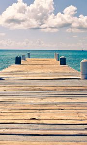 Preview wallpaper sea, pier, sky, clouds