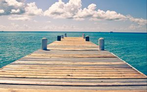 Preview wallpaper sea, pier, sky, clouds