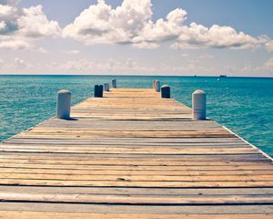 Preview wallpaper sea, pier, sky, clouds