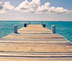 Preview wallpaper sea, pier, sky, clouds