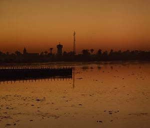 Preview wallpaper sea, pier, trees, sunset, reflection, nature